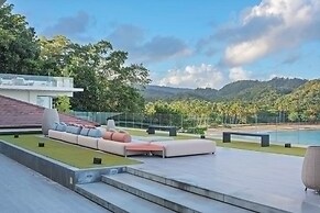 Gorgeous Beach House Perched Right Over the Ocean