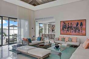 Gorgeous Beach House Perched Right Over the Ocean