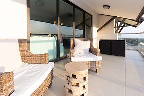 The Penthouse by Acomodo