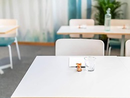 Inviting Hotel Room With Free Breakfast