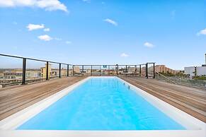 Modern Corner Unit Pool Steps From Palm Beach