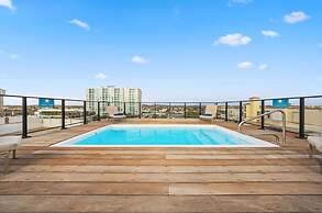 Modern Corner Unit Pool Steps From Palm Beach
