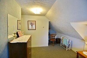 10th Avenue Guest House & Suites