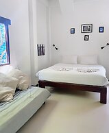 The Reef Hotel & Studios