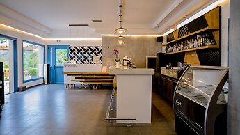 Xenia Residence & Suites