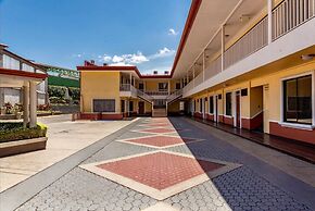 Prado Inn & Suites