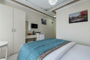 Atam Suites & Apart