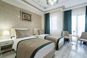 Atam Suites & Apart