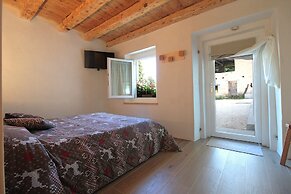 Baita Tersilia Near Lake And Mountain