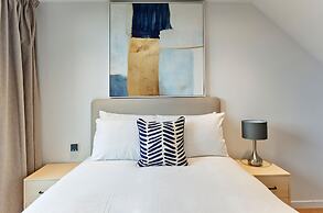 Upscale Two-bedroom Home in a Brutalist Setting