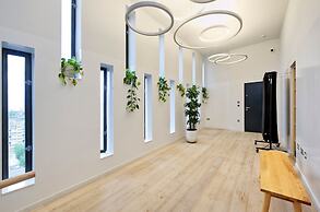 Upscale Two-bedroom Home in a Brutalist Setting