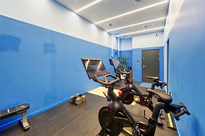 Upscale Two-bedroom Home in a Brutalist Setting