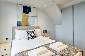 Upscale Two-bedroom Home in a Brutalist Setting