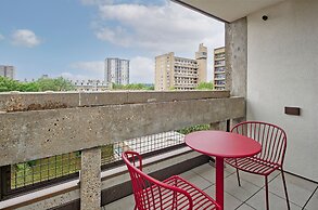 Upscale Two-bedroom Home in a Brutalist Setting