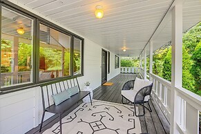 Porch, Yard & Creek Access: Spacious Sylva Home!