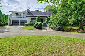 Porch, Yard & Creek Access: Spacious Sylva Home!