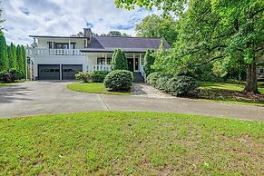 Porch, Yard & Creek Access: Spacious Sylva Home!