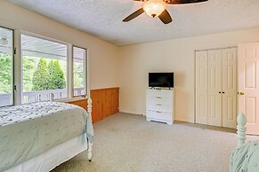 Porch, Yard & Creek Access: Spacious Sylva Home!