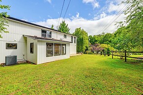 Porch, Yard & Creek Access: Spacious Sylva Home!