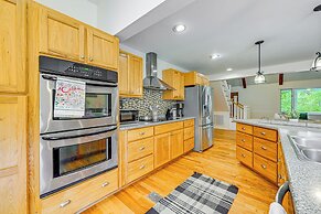 Porch, Yard & Creek Access: Spacious Sylva Home!