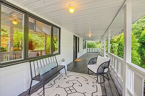 Porch, Yard & Creek Access: Spacious Sylva Home!