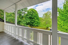 Porch, Yard & Creek Access: Spacious Sylva Home!