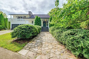 Porch, Yard & Creek Access: Spacious Sylva Home!