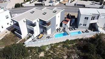 Apartments for 12 and 2 pools