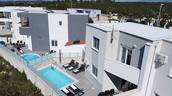 Apartments for 12 and 2 pools
