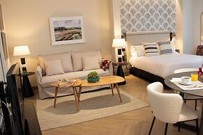 Puerta de la Ribera Suites