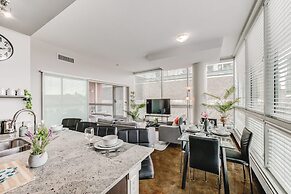 Luxury Condo Steps From Stampede Park