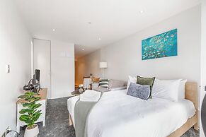 Central Studio + Private Balcony!