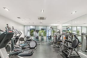 Central Studio + Private Balcony!