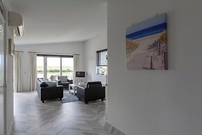 Beachside Apartment With Balcony