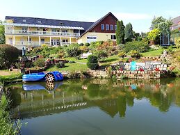 Roomy Apartment in Lichtenhain With Pond