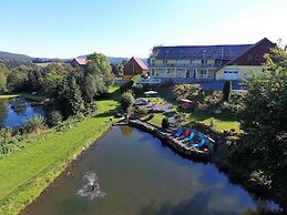Roomy Apartment in Lichtenhain With Pond