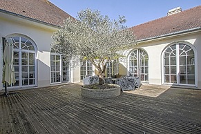 Spacious Holiday Home in Aure sur Mer With Garden