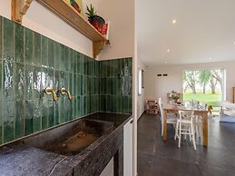 Spacious Holiday Home With Pond in Poperinge