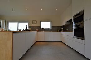 Spacious Holiday Home With Pond in Poperinge