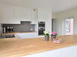 Spacious Holiday Home With Pond in Poperinge