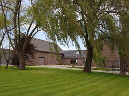 Spacious Holiday Home With Pond in Poperinge