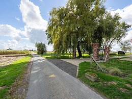 Spacious Holiday Home With Pond in Poperinge