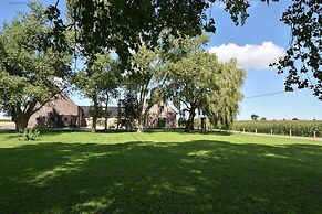 Spacious Holiday Home With Pond in Poperinge