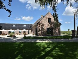 Spacious Holiday Home With Pond in Poperinge