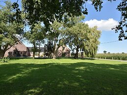 Spacious Holiday Home With Pond in Poperinge