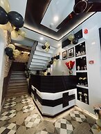 Hotel Golden Palm by Rattan's 1925