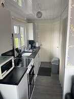 Charming Chalet Nestled in Heart of Clarach Bay