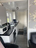 Charming Chalet Nestled in Heart of Clarach Bay