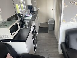 Charming Chalet Nestled in Heart of Clarach Bay