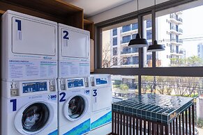 Estudio Pinheiros com piscina e academia